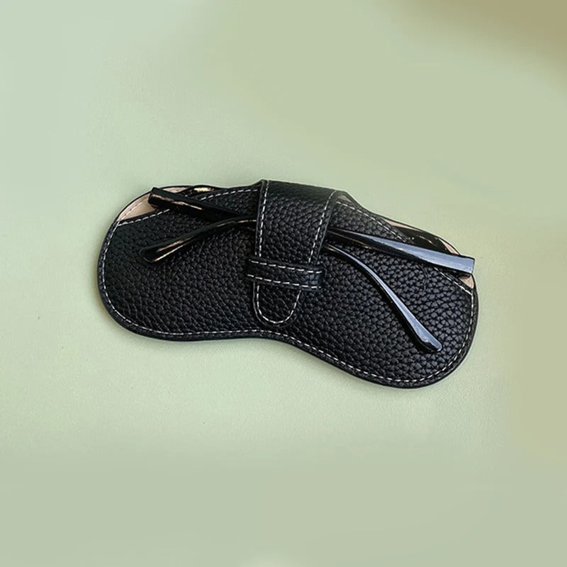 Lyckliga Glasögonväskan