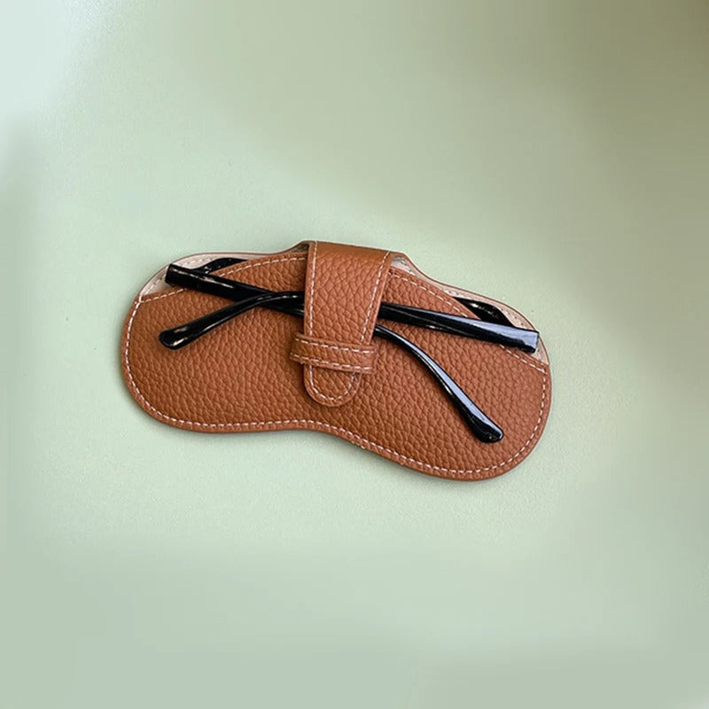 Lyckliga Glasögonväskan